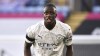 FILE - In this Saturday, April 3, 2021 file photo, Manchester City's Benjamin Mendy looks on during their English Premier League soccer match against Leicester City at the King Power Stadium in Leicester, England. Police say Manchester City left back Benjamin Mendy has on Thursday, Aug, 26 been charged with four counts of rape and one count of sexual assault. The 27-year-old Mendy was suspended by City pending an investigation. (AP Photo/Rui Vieira, file)
