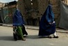 Afghan women in burqas walk on a street in Kabul, Afghanistan, Sunday, Aug. 22, 2021.  THE CANADIAN PRESS/AP-Rahmat Gul