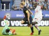 CF Montreal's Samuel Piette, centre, moves in on Toronto FC goalkeeper Quentin Westberg as Toronto's Chris Mavinga (23) defends during first half MLS soccer action in Montreal, Friday, August 27, 2021. THE CANADIAN PRESS/Graham Hughes