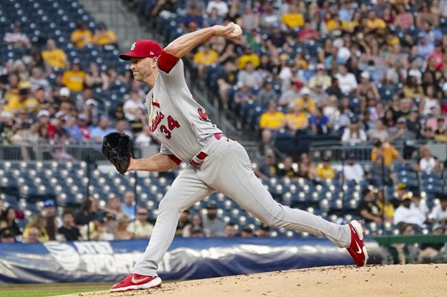 St. Louis Cardinals starter J.A. Happ pitches to a Pittsburgh Pirates batter during the first inning of a baseball game Friday, Aug. 27, 2021, in Pittsburgh. (AP Photo/Keith Srakocic)