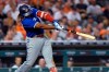 Toronto Blue Jays' Vladimir Guerrero Jr. singles against the Detroit Tigers during the fifth inning of a baseball game Friday, Aug. 27, 2021, in Detroit. (AP Photo/Jose Juarez)