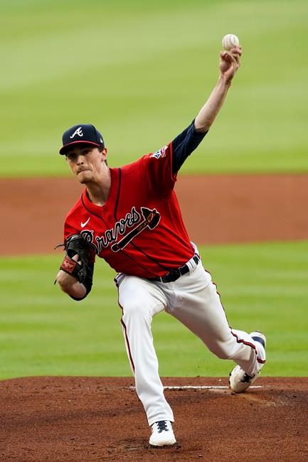 Atlanta Braves starting pitcher Max Fried delivers to a San Francisco Giants batter during the first inning of a baseball game Friday, Aug. 27, 2021, in Atlanta. (AP Photo/John Bazemore)