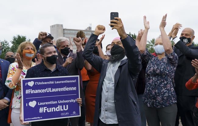 NDP Leader Jagmeet Singh records a video for social media surrounded by students, professors and candidates at the University of Sudbury, in Sudbury, Ont., Saturday, Aug. 28, 2021. THE CANADIAN PRESS/Paul Chiasson