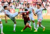 Leverkusen's Exequiel Palacios, left, Augsburg's Daniel Caligiuri, center, and Leverkusen's Charles Aranguiz, right, challenge for the ball during the German Bundesliga soccer match between FC Augsburg and Bayer Leverkusen in Augsburg, Germany, Aug. 28, 2021. (Matthias Balk/dpa via AP)
