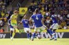 Norwich City's Josh Sargent, left, shoots during the English Premier League soccer match between Norwich City and Leicester City at Carrow Road, Norwich, England, Saturday, Aug. 28, 2021. (Joe Giddens/PA via AP)