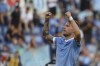 Lazio’s Ciro Immobile celebrates after scoring his side' second goal during the Serie A soccer match between Lazio and Spezia, at the Rome Olympic stadium, Saturday, Aug. 28, 2021. (Alfredo Falcone/LaPresse via AP)