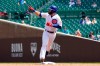 Chicago Cubs' David Bote points as he rounds the bases after hitting a solo home run in the second inning in the first baseball game of a doubleheader against the Colorado Rockies in Chicago, Wednesday, Aug. 25, 2021. (AP Photo/Nam Y. Huh)