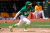 Oakland Athletics' Tony Kemp starts to run after hitting an RBI-single against the New York Yankees during the second inning of a baseball game in Oakland, Calif., Saturday, Aug. 28, 2021. (AP Photo/Jeff Chiu)
