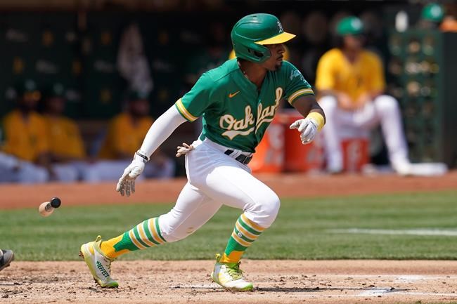 Oakland Athletics' Tony Kemp starts to run after hitting an RBI-single against the New York Yankees during the second inning of a baseball game in Oakland, Calif., Saturday, Aug. 28, 2021. (AP Photo/Jeff Chiu)