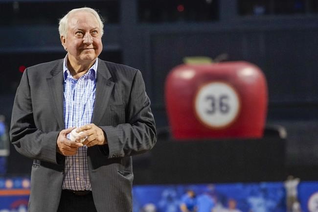 Former New York Mets pitcher Jerry Koosman looks up to the applauding fans in the stands during a ceremony Saturday, Aug. 28, 2021, at Citi Field in New York. The Mets retired Koosman's uniform No. 36 before their game against the Washington Nationals. (AP Photo/Mary Altaffer)
