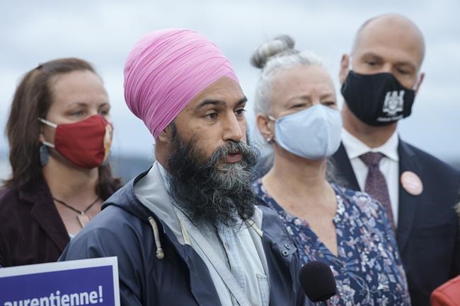 NDP Leader Jagmeet Singh responds to a question surrounded by students, professors and candidates at the University of Sudbury, in Sudbury, Ont., Saturday, Aug. 28, 2021. THE CANADIAN PRESS/Paul Chiasson