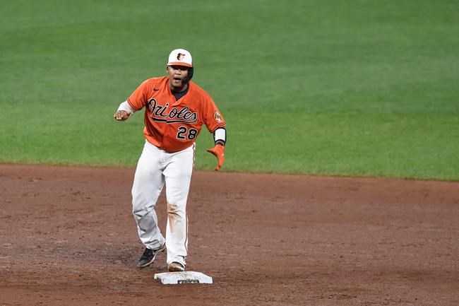 Baltimore Orioles' Pedro Severino reacts after hitting a one-run double against the Tampa Bay Rays in the sixth inning of baseball game, Saturday, Aug. 28, 2021, in Baltimore. (AP Photo/Gail Burton)