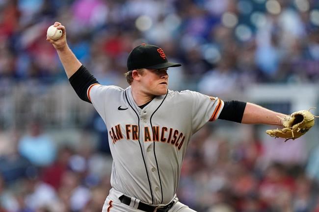 San Francisco Giants starting pitcher Logan Webb delivers in the first inning of a baseball game against the Atlanta Braves, Saturday, Aug. 28, 2021, in Atlanta. (AP Photo/John Bazemore)