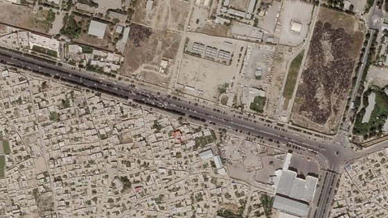 In this satellite photo taken by Planet Labs Inc., a Taliban checkpoint is seen blocking access just south of Kabul's international airport Saturday, Aug. 28, 2021. Taliban forces sealed off Kabul's airport Saturday to most Afghans hoping for evacuation, as the U.S. and its allies were ending a chaotic airlift that will end their troops' two decades in Afghanistan. (Planet Labs Inc. via AP)