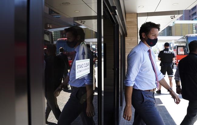 Liberal Leader Justin Trudeau makes his way to talk with reporters after taking part in a virtual G7 meeting on the crisis in Afghanistan virtually from Hamilton, Ont., on Tuesday, Aug 24, 2021. THE CANADIAN PRESS/Sean Kilpatrick