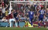 Burnley's Chris Wood scores his side's first goal of the game, during the English Premier League soccer match between Burnley FC and Leeds United, at Turf Moor, in Burnley, England, Sunday Aug. 29, 2021. (Richard Sellers/PA via AP)