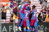 Barcelona's Sergi Roberto is celebrated by teammates after scoring his side's opening goal during the Spanish La Liga soccer match between Barcelona and Getafe, at the Camp Nou stadium in Barcelona, Spain, Sunday, Aug. 29, 2021. (AP Photo/Joan Monfort)