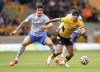Wolverhampton Wanderers' Raul Jimenez, right, and Manchester United's Harry Maguire battle for the ball during the English Premier League soccer match between Wolverhampton Wanderers and Manchester United at Molineux Stadium, Wolverhampton, England, Sunday, Aug. 29, 2021. (Nick Potts/PA via AP)