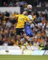 Wolverhampton Wanderers' Raul Jimenez, left, and Manchester United's Fred battle for the ball during the English Premier League soccer match between Wolverhampton Wanderers and Manchester United at Molineux Stadium, Wolverhampton, England, Sunday, Aug. 29, 2021. (Nick Potts/PA via AP)