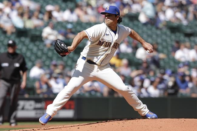 Seattle Mariners starting pitcher Marco Gonzales throws to a Kansas City Royals batter during the first inning of a baseball game Sunday, Aug. 29, 2021, in Seattle. (AP Photo/Jason Redmond)