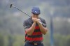 Bryson DeChambeau reacts after missing his putt on the ninth green during the final round of the BMW Championship golf tournament, Sunday, Aug. 29, 2021, at Caves Valley Golf Club in Owings Mills, Md. (AP Photo/Nick Wass)