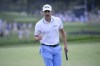 Patrick Cantlay reacts after sinking in his putt on the 18th green, the sixth playoff hole of the final round of the BMW Championship golf tournament, Sunday, Aug. 29, 2021, at Caves Valley Golf Club in Owings Mills, Md. (AP Photo/Nick Wass)
