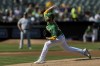 Oakland Athletics starting pitcher Paul Blackburn works against the New York Yankees in the first inning of a baseball game in Oakland, Calif., Sunday, Aug. 29, 2021. (AP Photo/John Hefti)