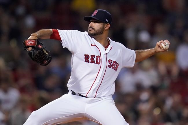 Boston Red Sox pitcher Martin Perez delivers during the eighth inning of the team's baseball game against the Minnesota Twins at Fenway Park, Wednesday, Aug. 25, 2021, in Boston. (AP Photo/Charles Krupa)