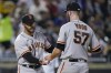 San Francisco Giants manager Gabe Kapler takes the ball from starting pitcher Alex Wood during the sixth inning of the team's baseball game against the New York Mets on Thursday, Aug. 26, 2021, in New York. (AP Photo/Frank Franklin II)
