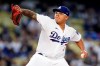 Los Angeles Dodgers starting pitcher Julio Urias throws during the first inning of a baseball game against the Atlanta Braves, Monday, Aug. 30, 2021, in Los Angeles. (AP Photo/Marcio Jose Sanchez)