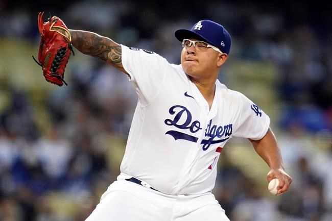 Los Angeles Dodgers starting pitcher Julio Urias throws during the first inning of a baseball game against the Atlanta Braves, Monday, Aug. 30, 2021, in Los Angeles. (AP Photo/Marcio Jose Sanchez)
