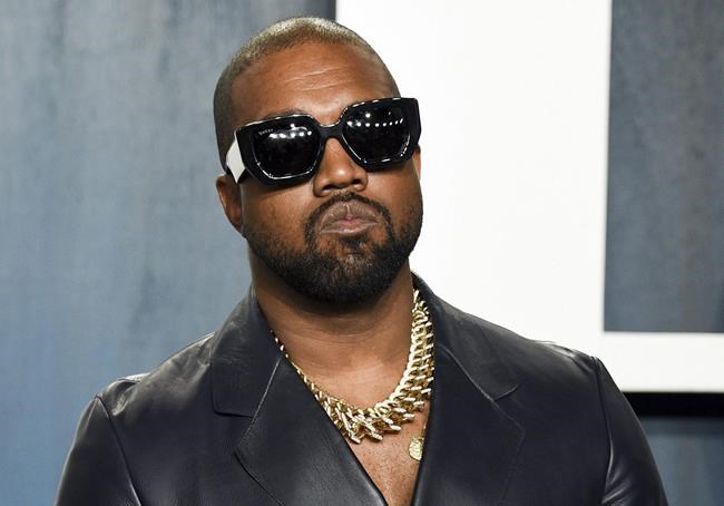 FILE - Kanye West arrives at the Vanity Fair Oscar Party in Beverly Hills, Calif., on Feb. 9, 2020. West's latest release is “Donda.” (Photo by Evan Agostini/Invision/AP, File)