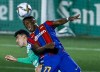 FILE - In this Thursday, Jan. 21, 2021 file photo, Barcelona's Ilaix Moriba, foreground heads for the balls with Cornella's Ontiveros during a Spanish Copa del Rey round of 32 soccer match between Cornella and FC Barcelona at the Nou Municipal stadium in Cornella, Spain. German soccer clubs resisted last-minute splurges on players with Leipzig’s capture of highly rated teenager Ilaix Moriba from Barcelona the most eye-catching move on the last day of the summer transfer window. Leipzig said Tuesday, Aug. 31, 2021 that the 18-year-old Moriba, who came though Barcelona’s youth academy and made 18 appearances for the senior team, had signed a five-year deal. (AP Photo/Joan Monfort, File)