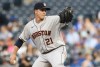 Houston Astros starting pitcher Zack Greinke throws to a Kansas City Royals batter during the first inning of a baseball game Wednesday, Aug. 18, 2021, in Kansas City, Mo. (AP Photo/Reed Hoffmann)