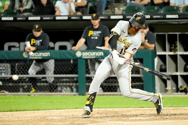 Pittsburgh Pirates' Colin Moran swings for an RBI single off Chicago White Sox starting pitcher Lucas Giolito during the fifth inning of a baseball game Tuesday, Aug. 31, 2021, in Chicago. Ben Gamel scored on the play. (AP Photo/Charles Rex Arbogast)