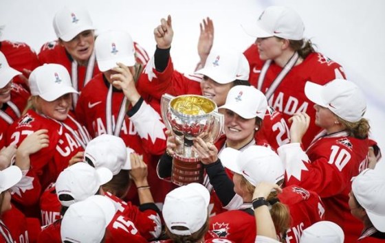 Team Canada's Marie-Philip Poulin, centre, celebrates defeating the United States to win gold at the IIHF Women's World Championship hockey action in Calgary, Tuesday, Aug. 31, 2021.THE CANADIAN PRESS/Jeff McIntosh