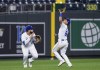Kansas City Royals shortstop Nicky Lopez (8) avoids colliding with third baseman Emmanuel Rivera while catching a fly ball hit by Cleveland Indians' Daniel Johnson during the seventh inning of a baseball game Tuesday, Aug. 31, 2021, in Kansas City, Mo. (AP Photo/Reed Hoffmann)