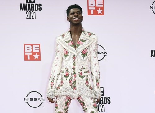 FILE - Lil Nas X arrives at the BET Awards on June 27, 2021, in Los Angeles. The rapper has been awarded the inaugural Suicide Prevention Advocate of the Year Award from the advocacy group The Trevor Project. The Trevor Project is a nonprofit dedicated to suicide prevention and crisis intervention for lesbian, gay, bisexual, transgender, queer and questioning young people. (Photo by Jordan Strauss/Invision/AP, File)