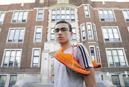 Oliver Waddington, 16, who is a senior high school student at Glebe Collegiate Institute, is pictured at the school in Ottawa on Tuesday, Aug 31, 2021. Waddington, who competes in cross-country and track and field, is disappointed in the school board's decision to pause extracurriculars. THE CANADIAN PRESS/Sean Kilpatrick