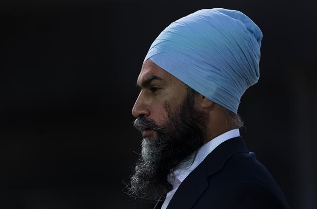 New Democratic leader Jagmeet Singh listens to a question from the media during a campaign stop, Wednesday, September 1, 2021 in Montreal. THE CANADIAN PRESS/Adrian Wyld