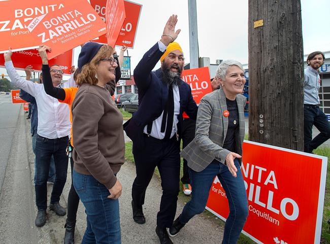 NDP Leader Jagmeet Singh makes a campaign stop with Bonita Zarrillo (right), candidate in the riding of Port Moody-Coquitlam, in Port Moody, B.C. on Wednesday, Sept. 25, 2019. Two candidates who met in a political duel decided by a slim margin of 153 votes in 2019 are facing each other again on Sept. 20 in British Columbia's Port Moody-Coquitlam riding.THE CANADIAN PRESS/Andrew Vaughan