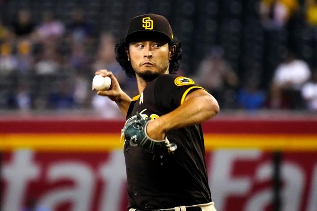 San Diego Padres pitcher Yu Darvish throws against the Arizona Diamondbacks in the first inning during a baseball game, Wednesday, Sept. 1, 2021, in Phoenix. (AP Photo/Rick Scuteri)