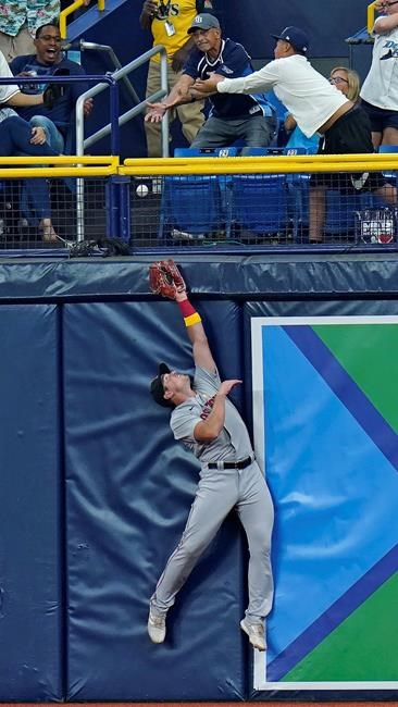 Boston Red Sox right fielder Hunter Renfroe leaps but can't make the catch on a two-run home run by Tampa Bay Rays' Wander Franco during the third inning of a baseball game Wednesday, Sept. 1, 2021, in St. Petersburg, Fla. (AP Photo/Chris O'Meara)