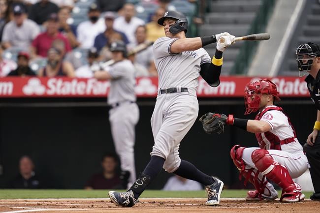 New York Yankees' Aaron Judge singles during the first inning of a baseball game against the Los Angeles Angels Wednesday, Sep. 1, 2021, in Anaheim, Calif. (AP Photo/Ashley Landis)