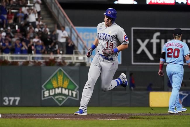Chicago Cubs' Frank Schwindel (18) runs the bases on his three-run home run off Minnesota Twins pitcher Joe Ryan during the third inning of a baseball game Wednesday, Sept. 1, 2021, in Minneapolis. (AP Photo/Jim Mone)