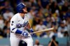 Los Angeles Dodgers' Max Muncy watches his triple during the third inning of the team's baseball game against the Atlanta Braves on Wednesday, Sept. 1, 2021, in Los Angeles. (AP Photo/Marcio Jose Sanchez)