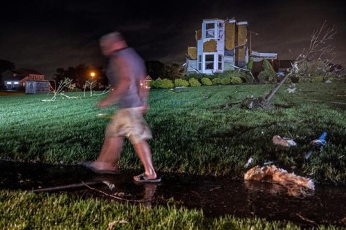 A home that was damaged by a possible tornado is seen on the corner of Josephine and Marvin Lanes in Harrison Township, N.J, Wednesday Sept. 1, 2021. The remnants of hurricane Ida brought heavy rains and possible tornadoes to the area (Tom Gralish/The Philadelphia Inquirer via AP)