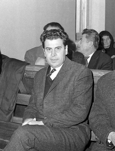 FILE - In this Jan. 24, 1968 file photo, Greek composer Mikis Theodorakis sits in the Appeals Court, in Athens, Greece, after he had qualified to be released from prison under leniency measures enacted by the ruling Greek Junta. Mikis Theodorakis, the beloved Greek composer whose rousing music and life of political defiance won acclaim abroad and inspired millions at home, died on Thursday, Sept. 2, 2021. He was 96. (AP Photo/File)