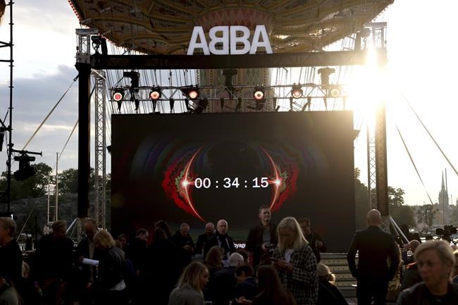 A view of a countdown to the ABBA Voyage event at Grona Lund, in Stockholm, Sweden, Thursday, Sept. 2, 2021. ABBA is releasing its first new music in four decades, along with a concert performance that will see the “Dancing Queen” quartet going entirely digital. The forthcoming album “Voyage,” to be released Nov. 5, is a follow-up to 1981′s “The Visitors,” which until now had been the swan song of the Swedish supergroup. And a virtual version of the band will begin a series of concerts in London May 27. (Fredrik Persson/TT News Agency via AP)