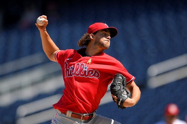 Philadelphia Phillies starting pitcher Aaron Nola delivers a pitch during the fourth inning of a baseball game against the Washington Nationals, Thursday, Sept. 2, 2021, in Washington. (AP Photo/Nick Wass)